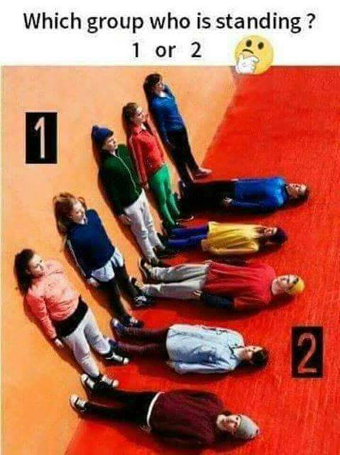 Which Group is standing